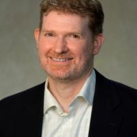 Headshot of John McGreevey